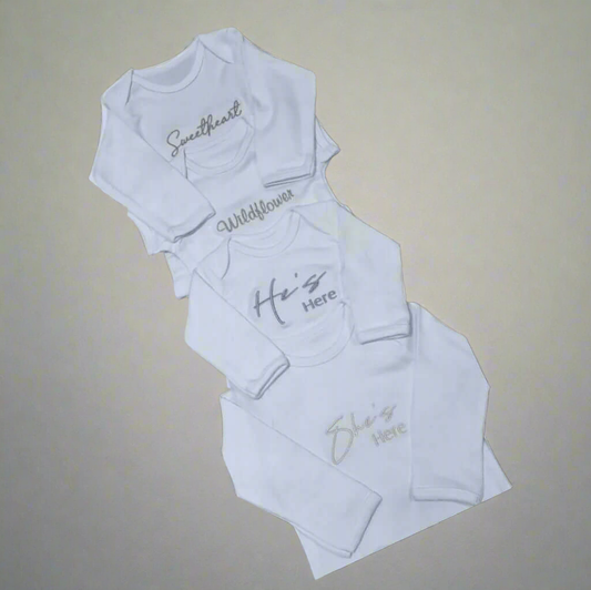 Embroidered themed baby grows
