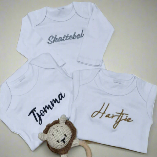 Embroidered themed baby grows